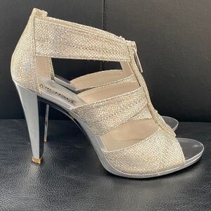 Michael Kors Berkley T Strap silver heels size 8M.